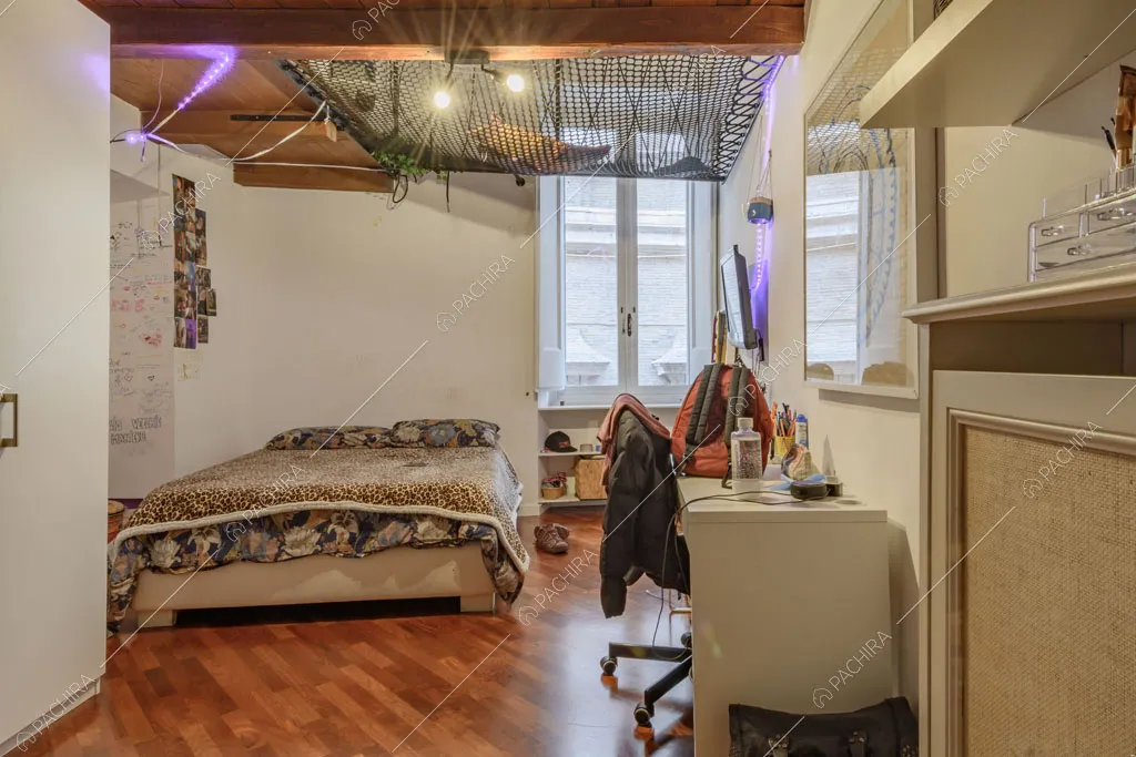 Camera da letto del loft Rooibois, location in stile moderno per shooting a Roma