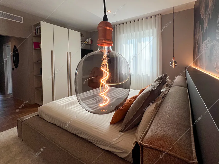 Camera da letto dell'appartamento Morganite, location in stile contemporaneo per shooting a Milano
