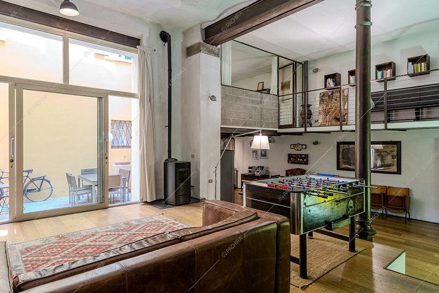 Open space del loft Foraker, location in stile vintage a Bergamo