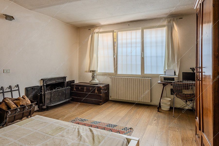 Camera da letto del loft Foraker, location in stile vintage a Bergamo