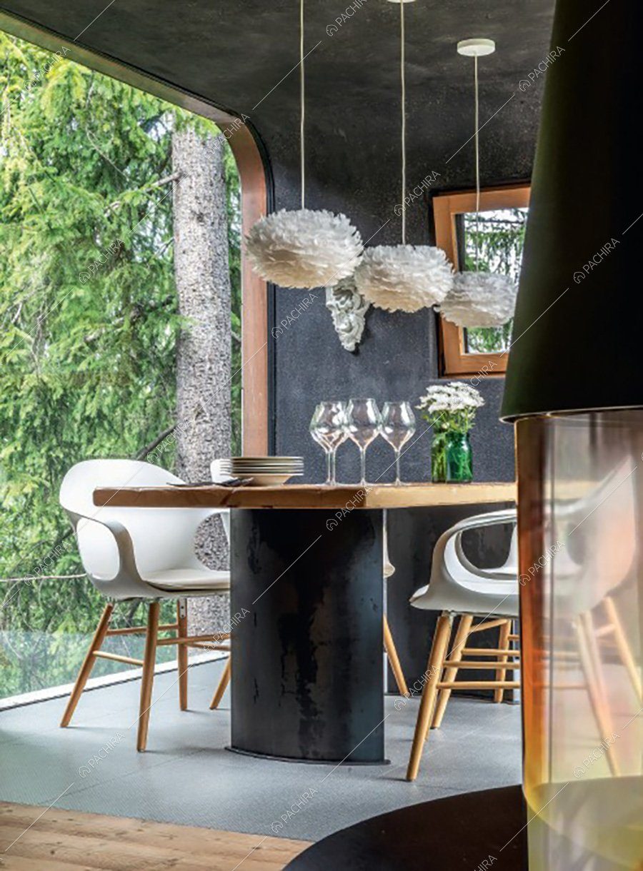 Zona pranzo dello chalet Buran, location contemporanea per shooting a Bolzano