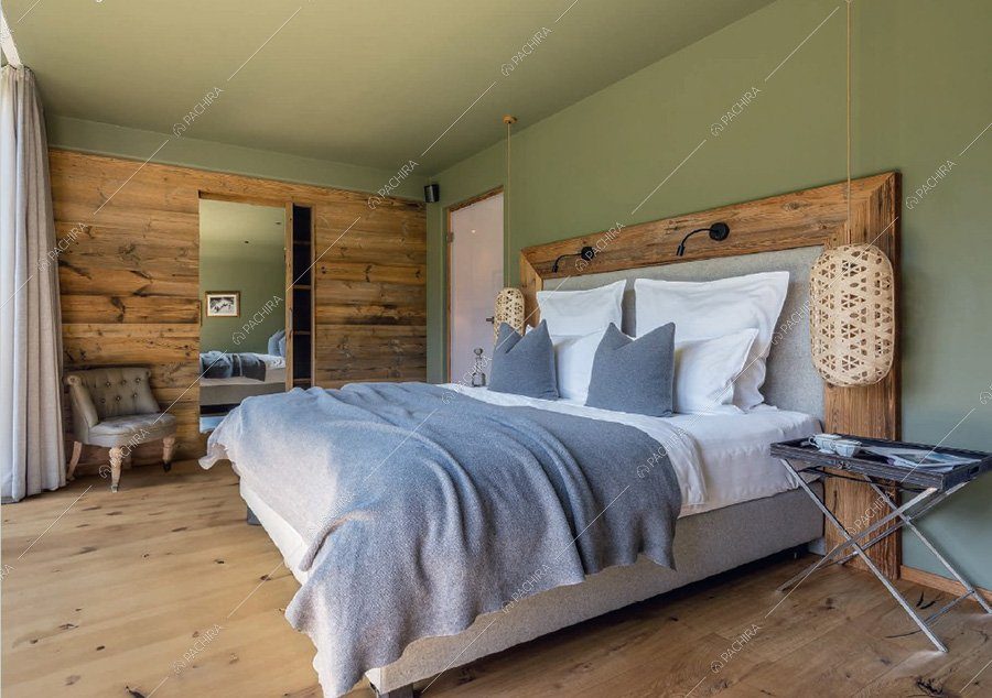 Camera da letto dello chalet Buran, location contemporanea per shooting a Bolzano