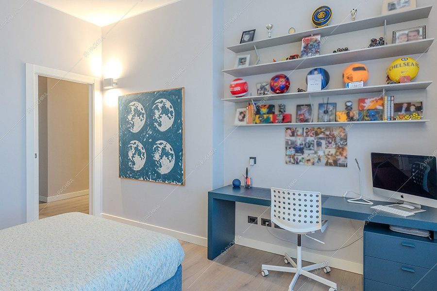 Camera da letto del loft Favo, location contemporanea per shooting a Milano
