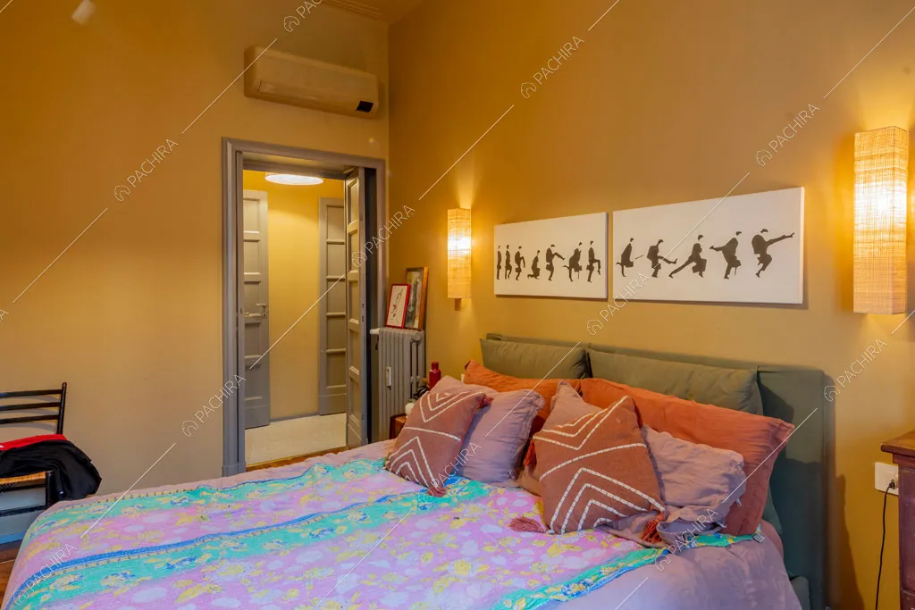 Camera da letto dell'appartamento Indo, location in stile contemporaneo a Milano