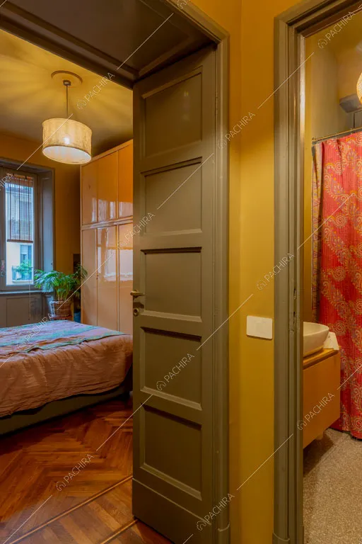 Camera da letto dell'appartamento Indo, location in stile contemporaneo a Milano
