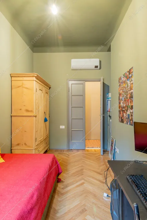 Camera da letto dell'appartamento Indo, location in stile contemporaneo a Milano