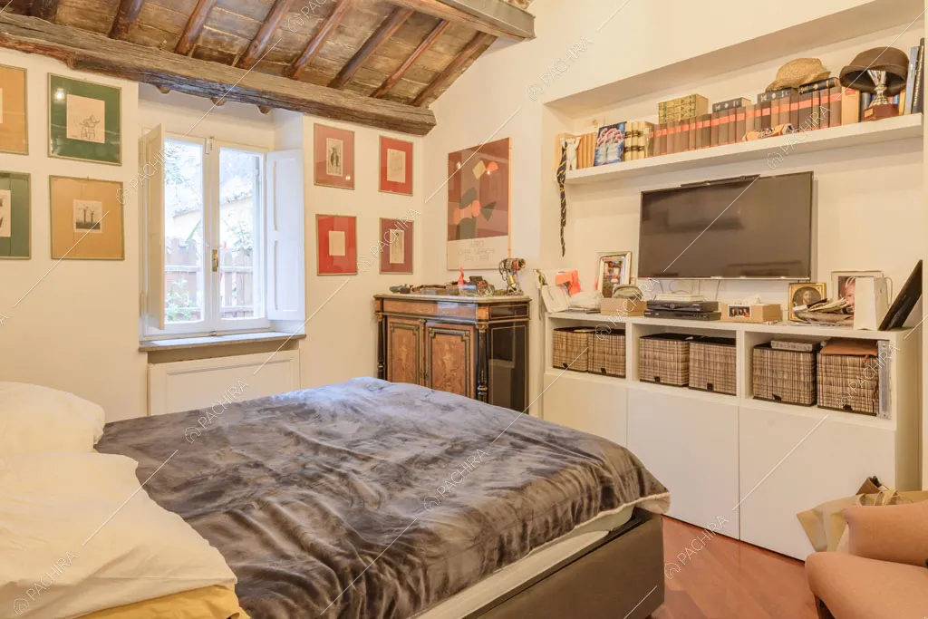 Camera da letto dell'appartamento Roobois, location in stile insolito a Roma