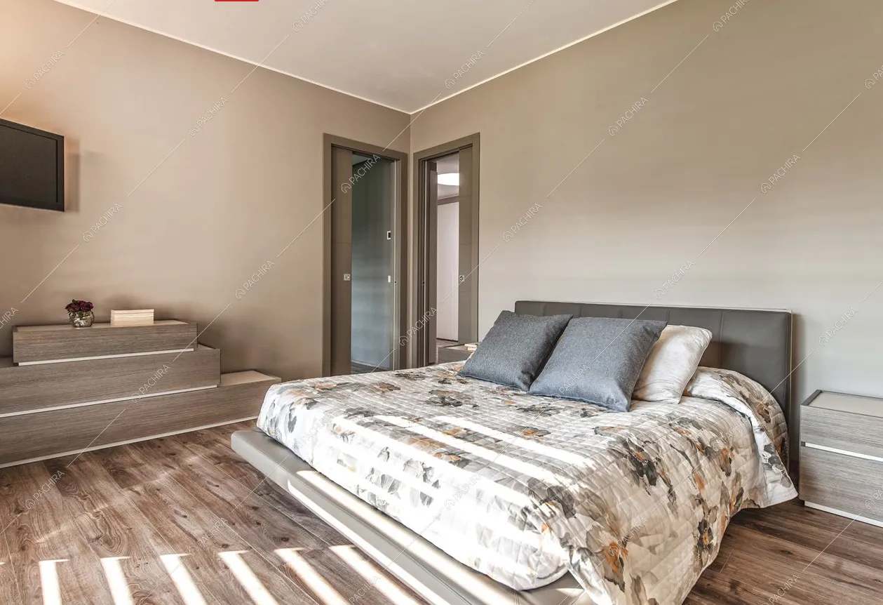 Camera da letto matrimoniale e pavimento in parquet