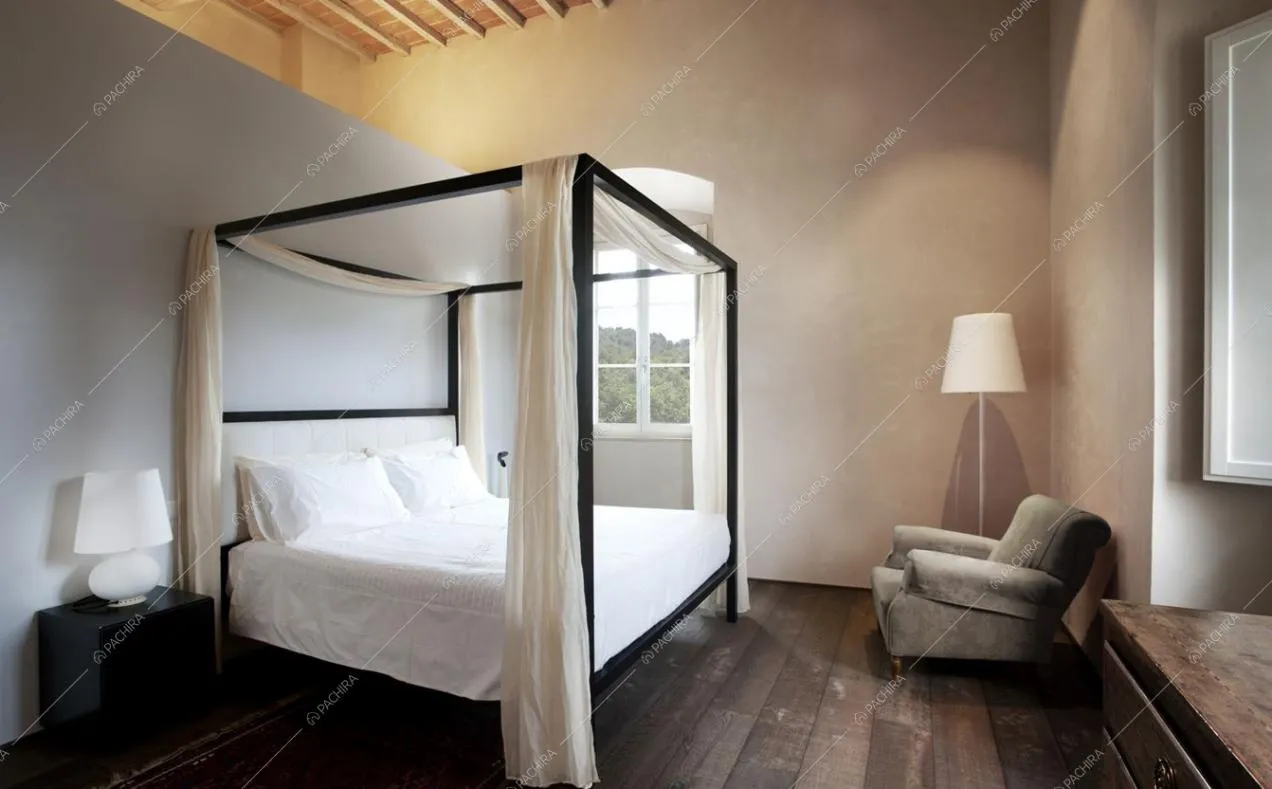 Letto a baldacchino nella Location Zizania
