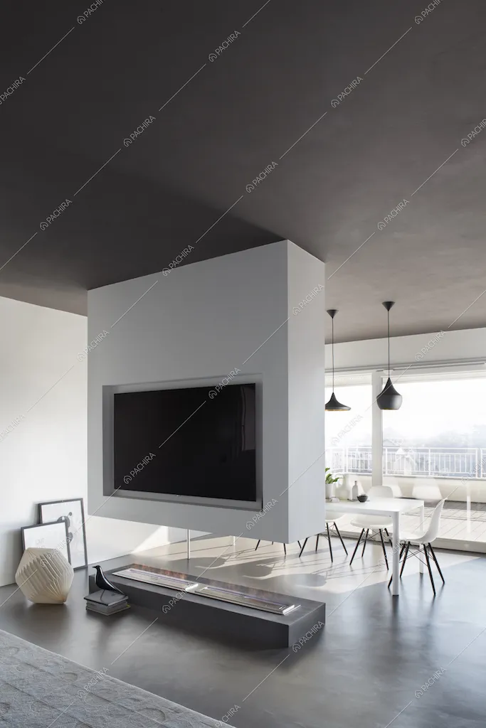 Pavimento in cemento lisciato e resina nella sala da pranzo della Location Tulipano