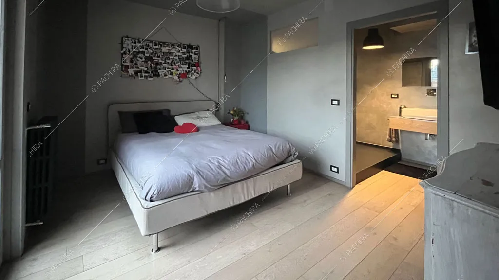Camera da letto della villa Andesine, location in stile moderno a Roma