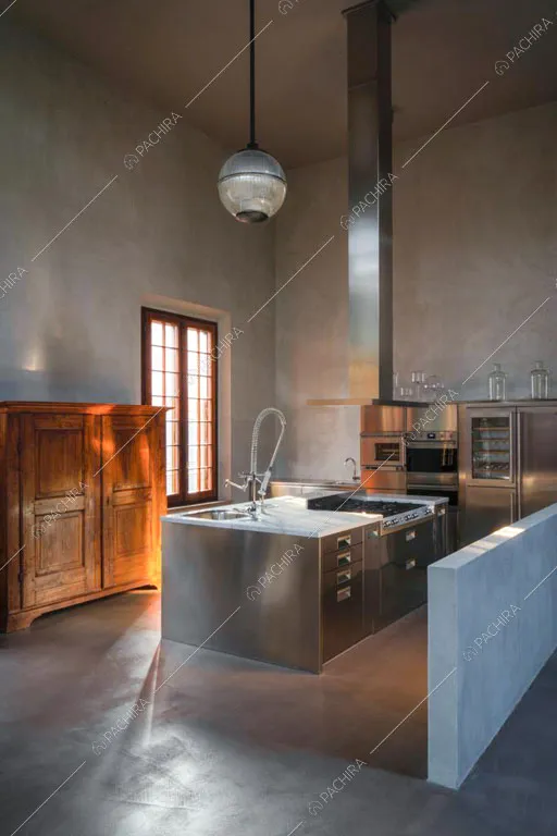 Cucina a isola del loft Reno, location in stile contemporaneo a Reggio Emilia