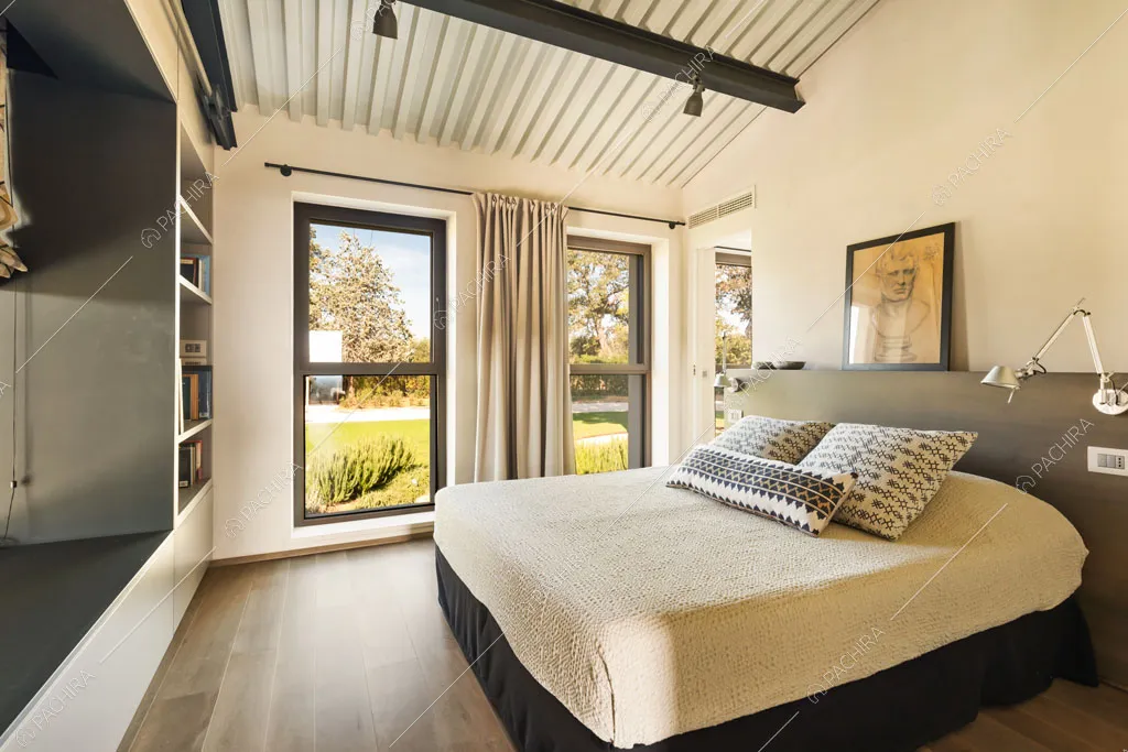Camera da letto della villa Gypsum, location in stile moderno a Grosseto