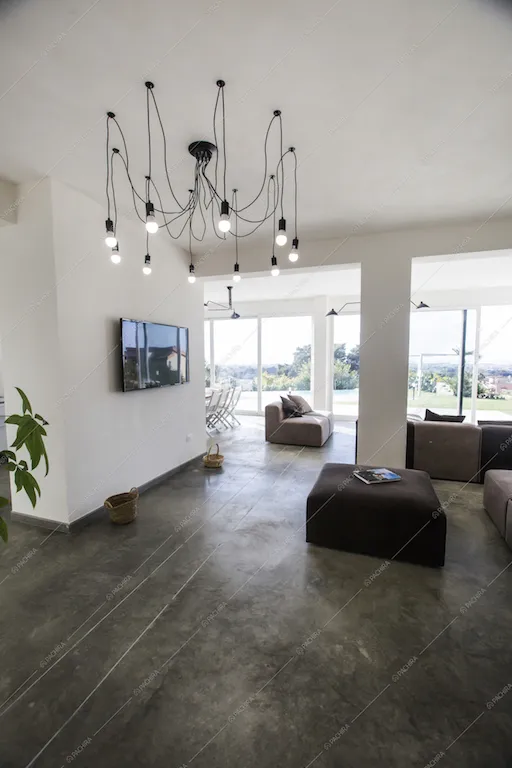 Living con pavimento in cemento resinato