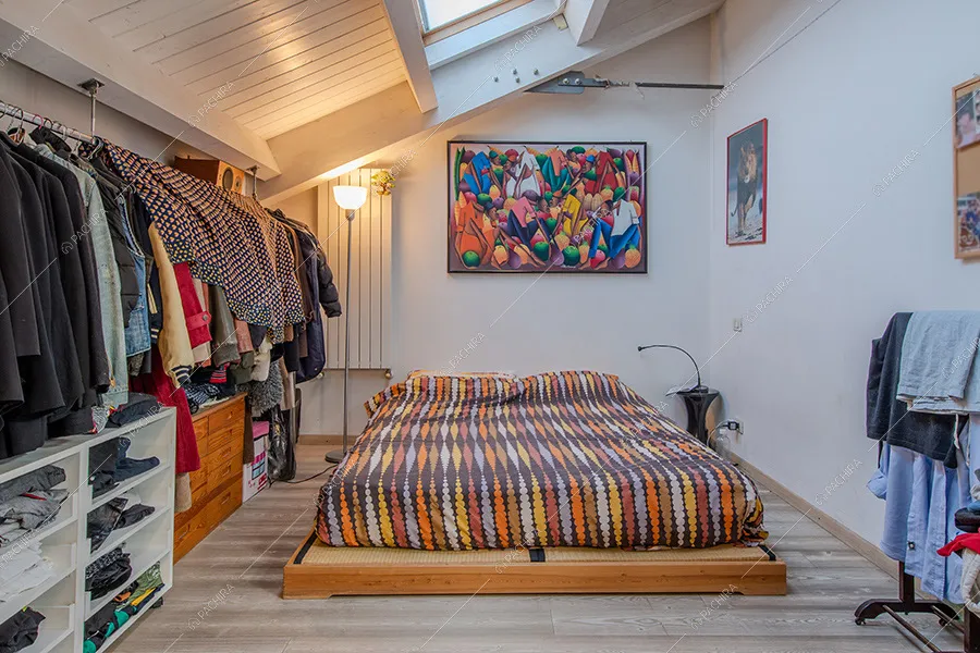 Camera da letto del loft Fittonia, location in stile contemporaneo a Milano