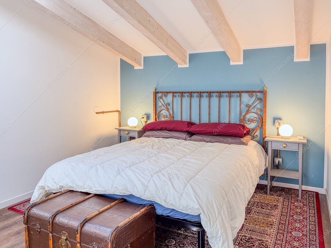 Camera da letto del loft Gazania, location contemporanea a Milano