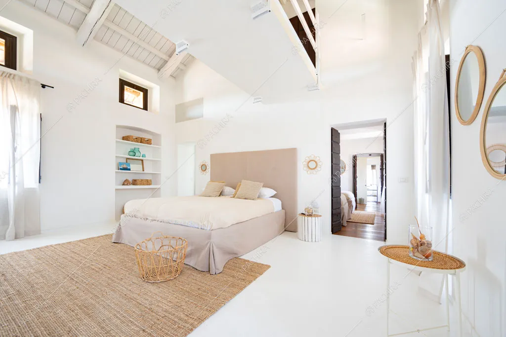 Travi a vista sul soffitto della camera da letto dell'agriturismo Favonio, location in stile country a Novara