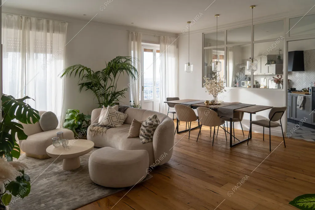Zona living con cucina a vista dell'appartamento Granadella, location in stile contemporaneo a Roma