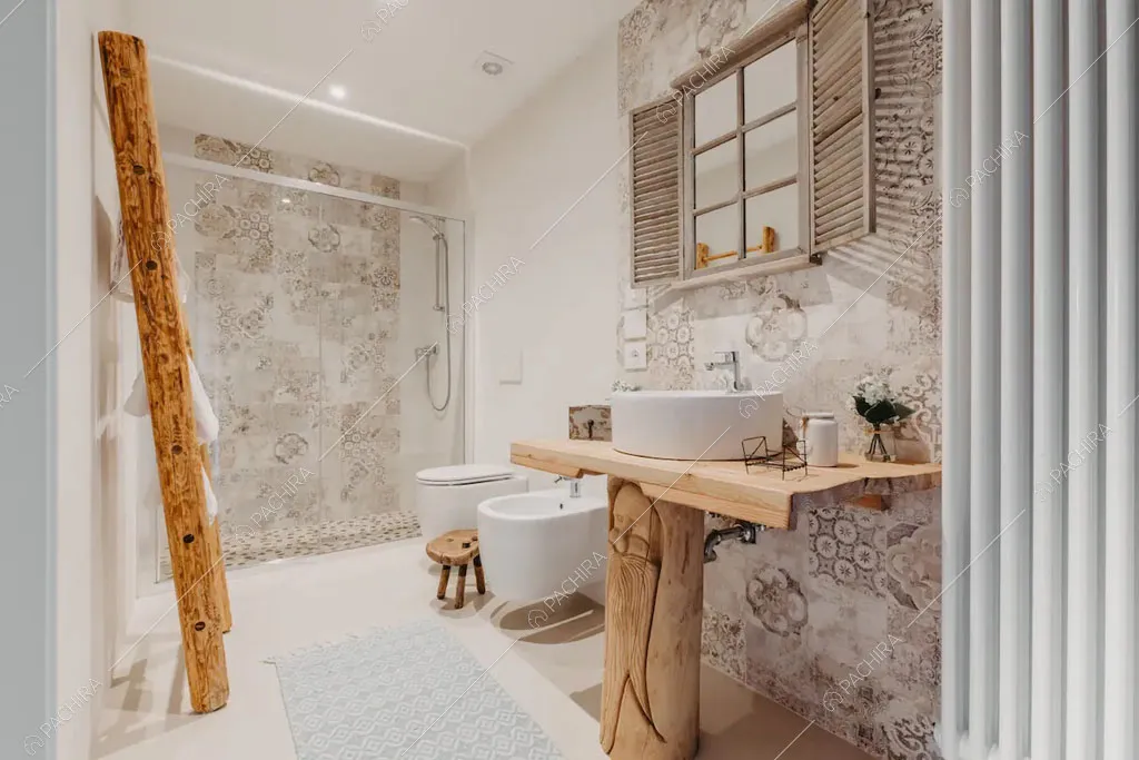 Bagno con box doccia dello chalet Timor, location in stile rustico a Trento