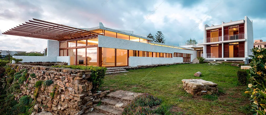 Vista sugli esterni bianchi e in legno della villa Libeccio, location in stile moderno a Roma
