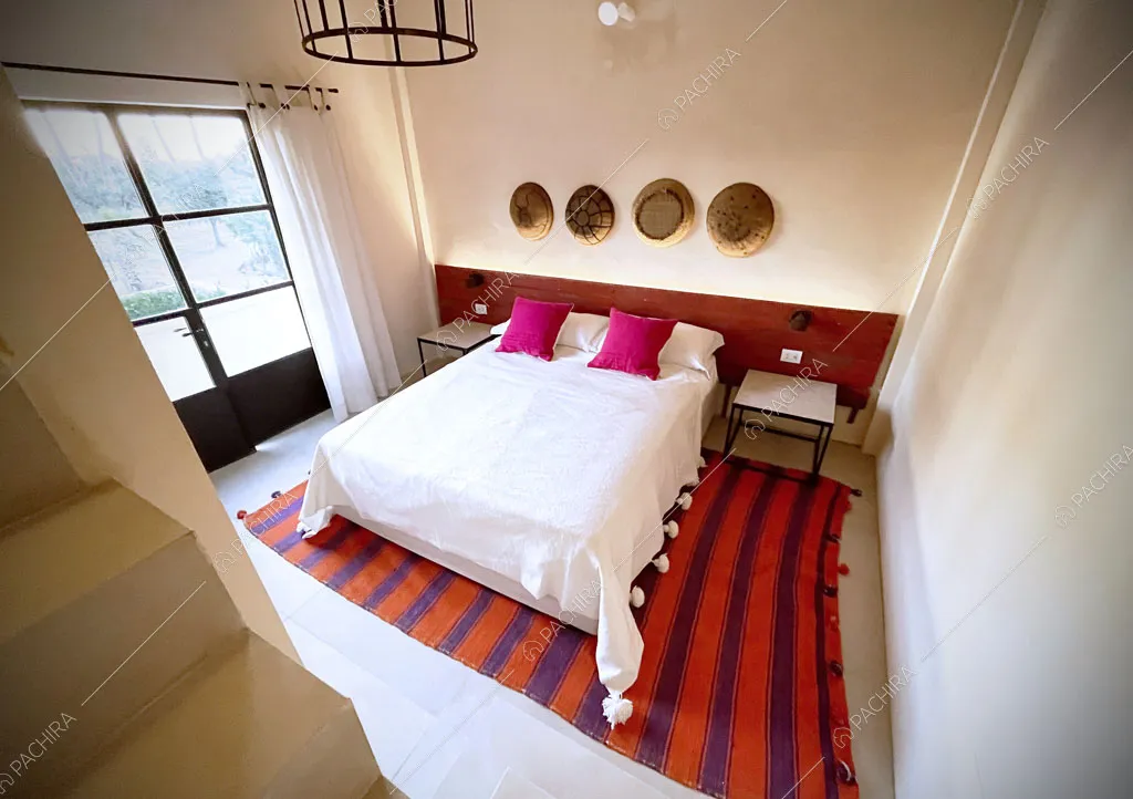 Camera da letto matrimoniale della villa Bali, location in stile contemporaneo a Lecce