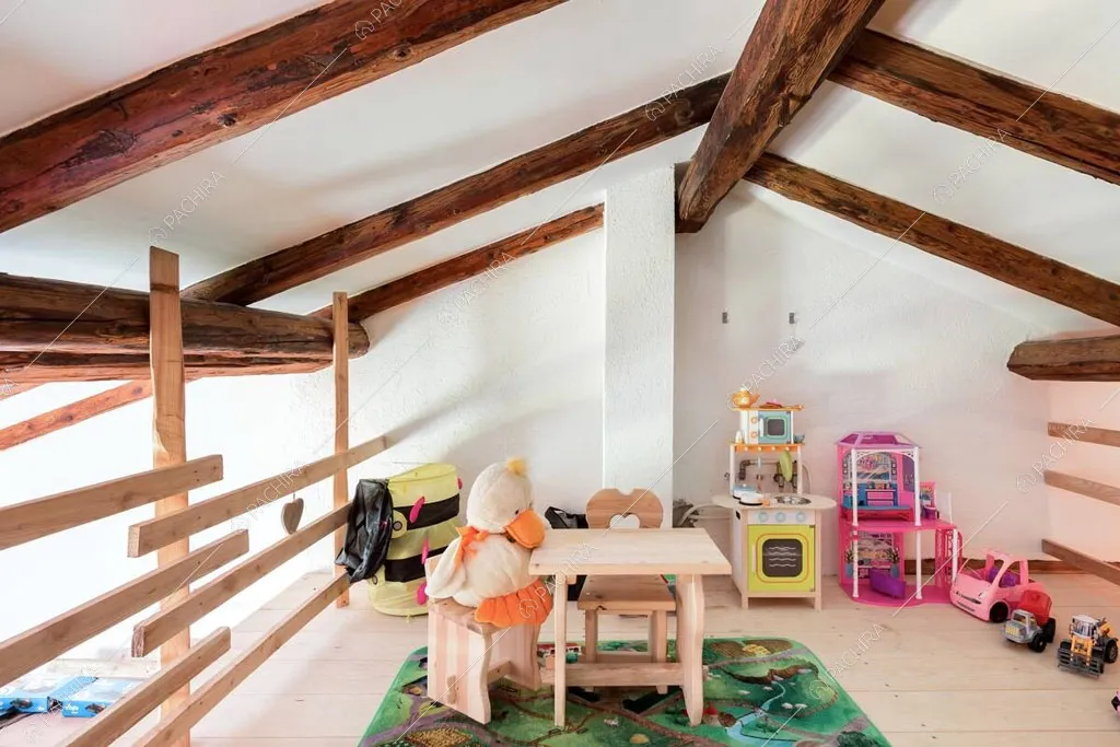 Stanza giochi sul soppalco dello chalet Cantabrico, location in stile rustico a Trento