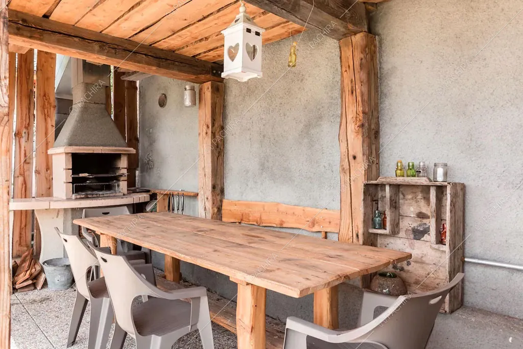 Veranda dello chalet Cantabrico, location in stile rustico a Trento