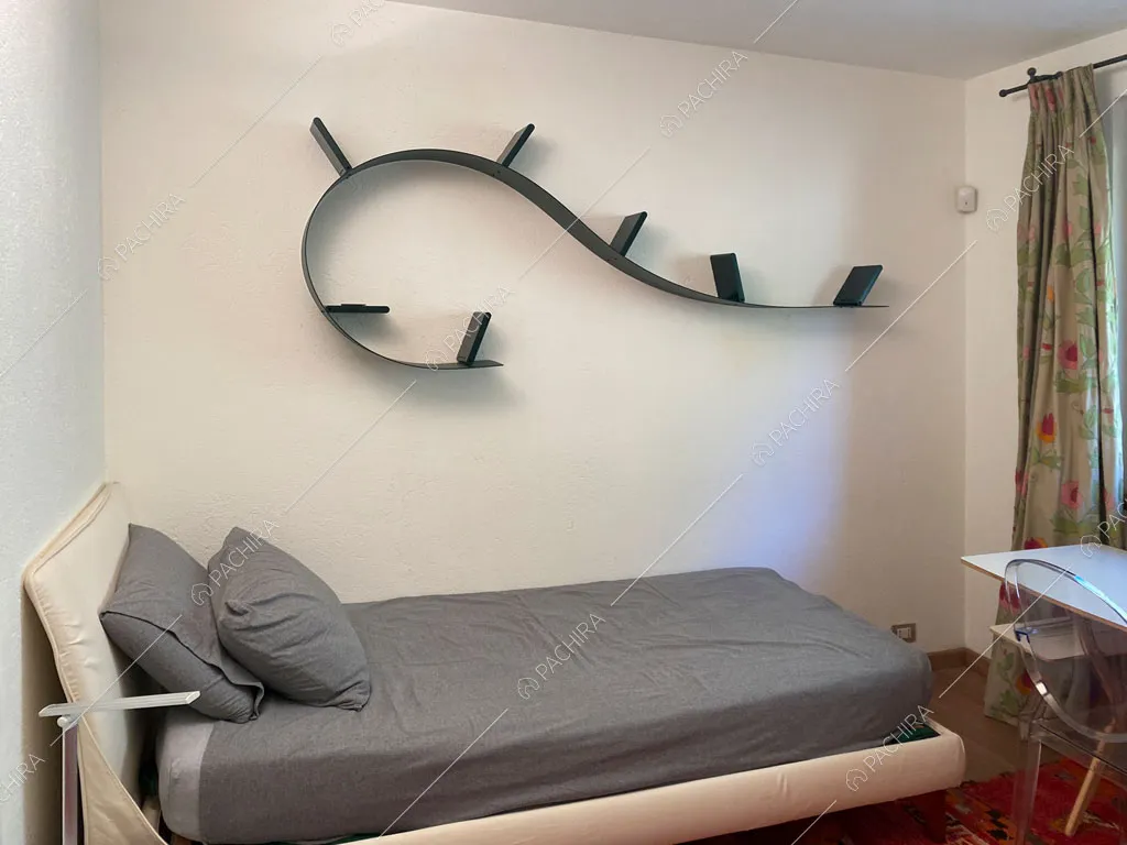 Camera da letto della villa Aqaba, location in stile contemporaneo ad Aosta
