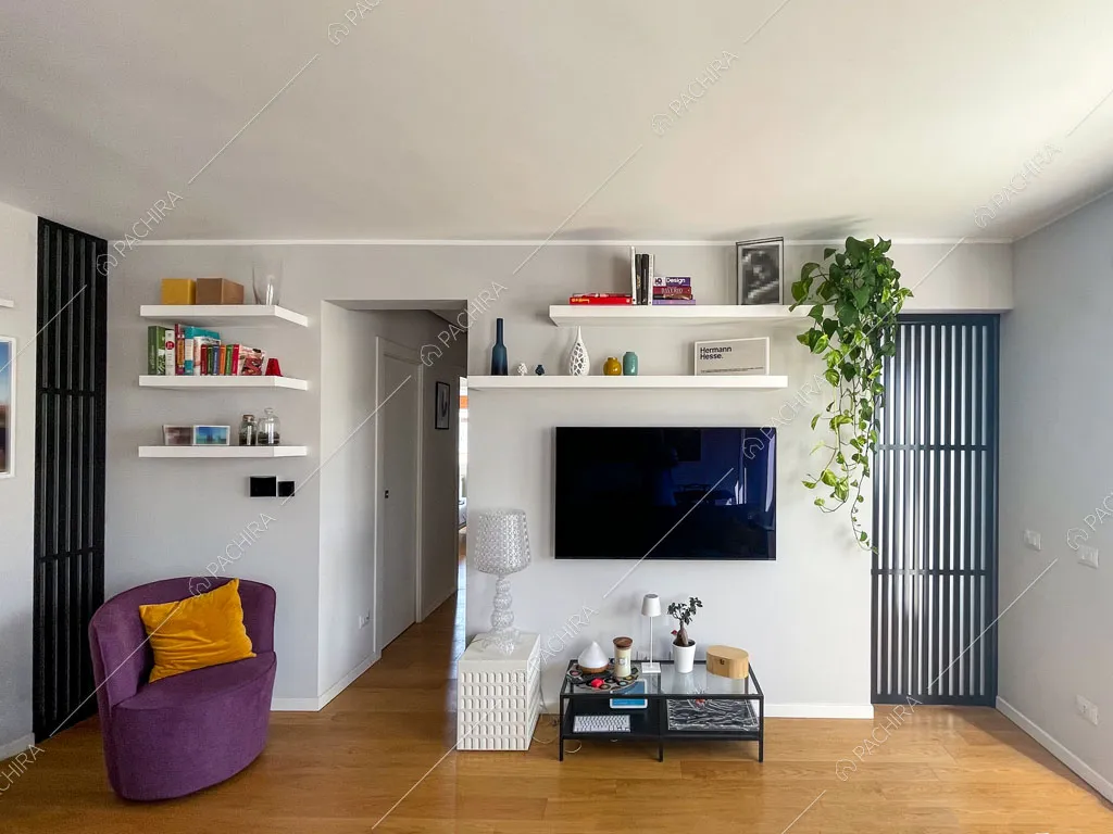 Sala con pavimento in parquet dell'appartamento Terfezia, location in stile contemporaneo a Roma