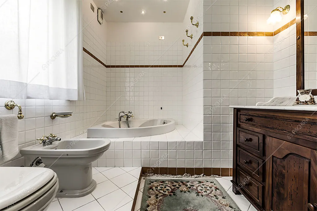 Vasca idromassaggio nel bagno dello chalet Betel, location in stile rustico a Lecco