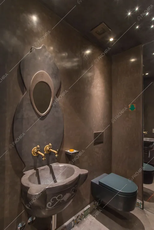 Bagno con sanitari sospesi dell'attico Karite, location in stile contemporaneo a Roma