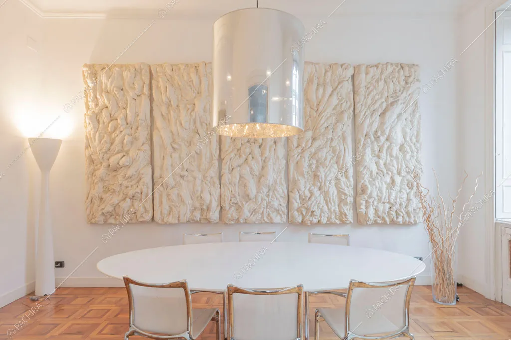 Sala da pranzo dell'appartamento Kiwano, location in stile moderno a Roma
