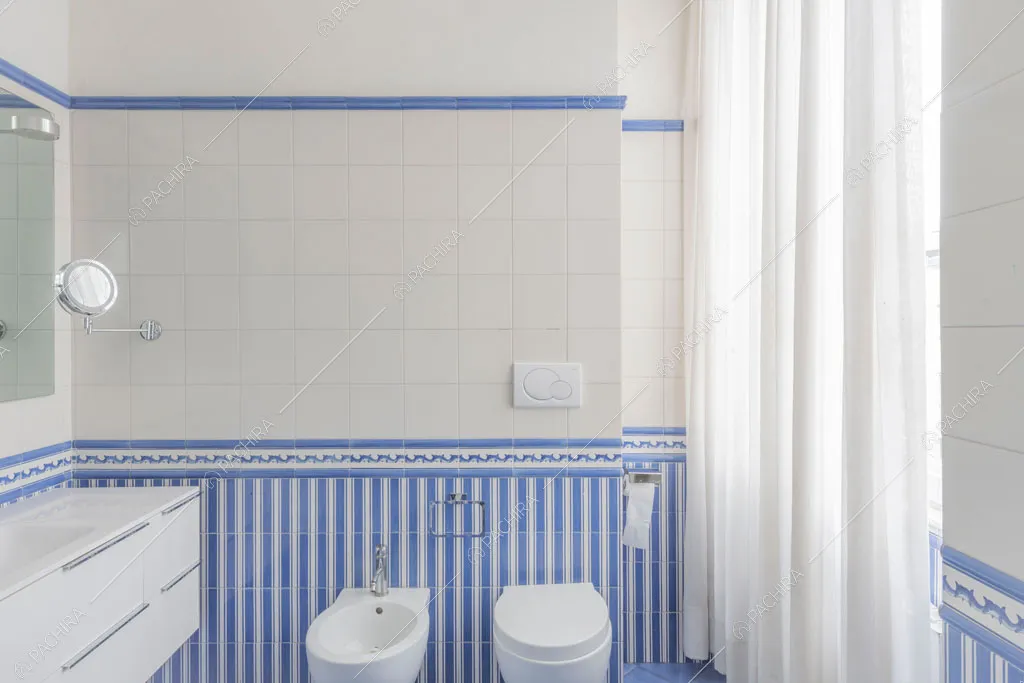 Bagno dell'appartamento Kiwano, location in stile moderno a Roma