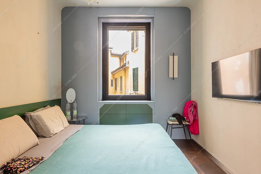 Camera da letto dell'appartamento Chaiotte, location in stile moderno a Milano