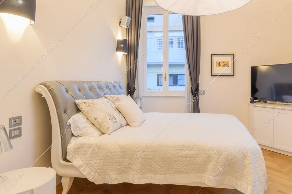 Camera da letto della location Amur, appartamento in stile insolito a Roma