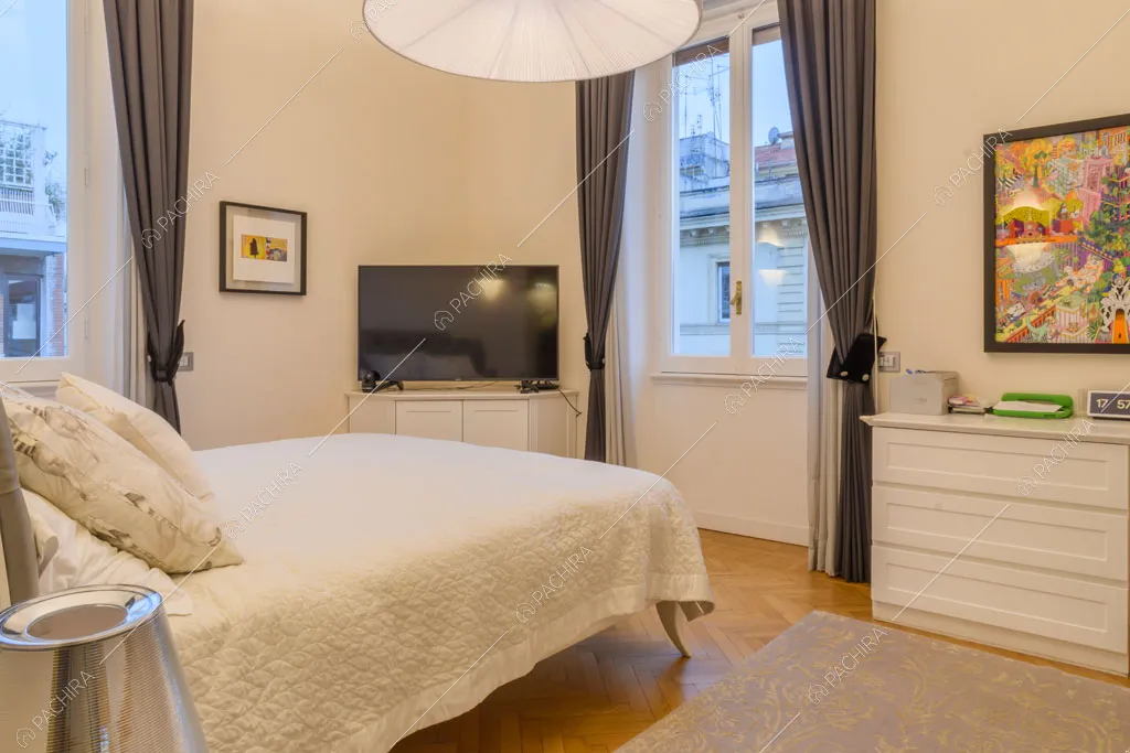 Camera da letto della location Amur, appartamento in stile insolito a Roma
