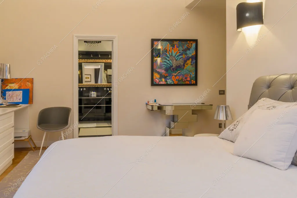 Camera da letto della location Amur, appartamento in stile insolito a Roma