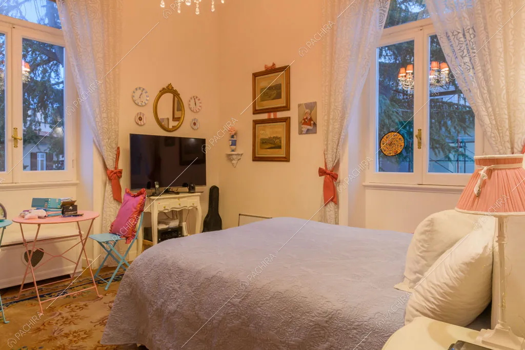 Camera da letto della location Amur, appartamento in stile insolito a Roma