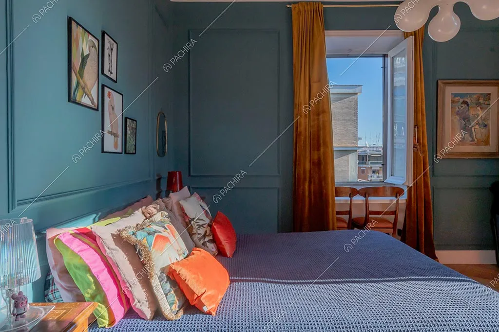 Camera da letto dell'appartamento Zambesi, location in stile eclettico a Roma