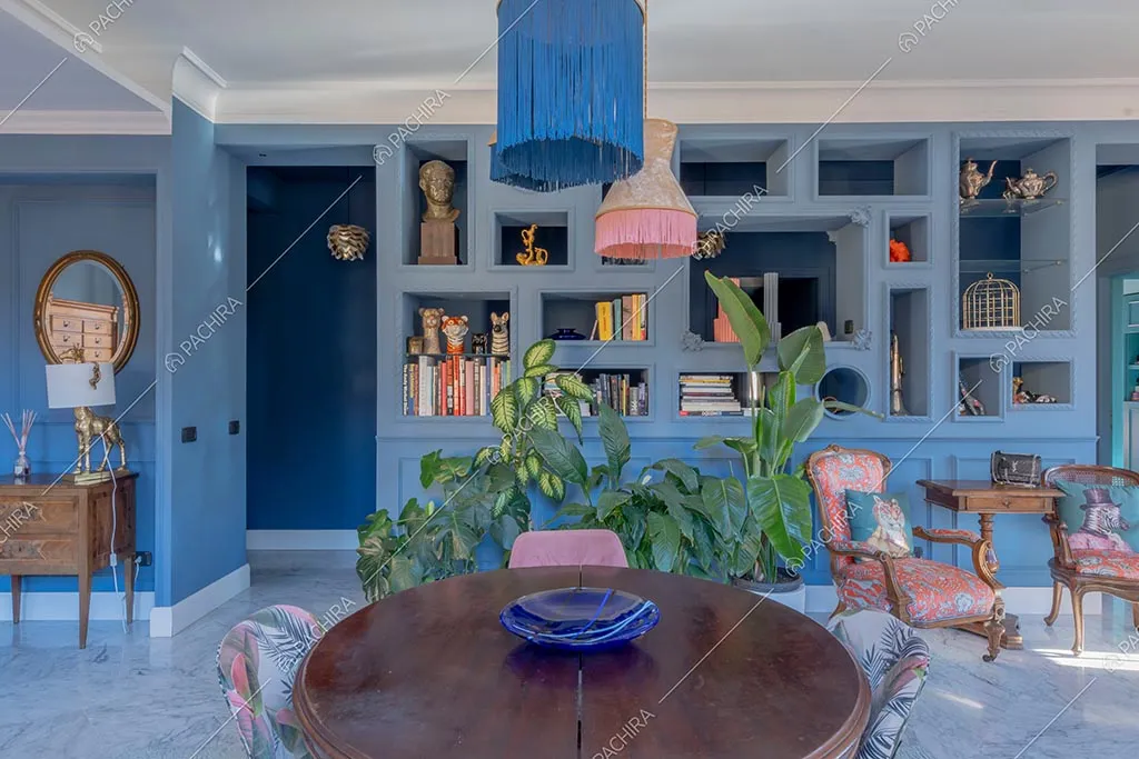 Zona living dell'appartamento Zambesi, location in stile eclettico a Roma