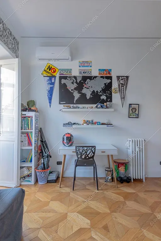 Camera da letto dell'appartamento Zambesi, location in stile eclettico a Roma