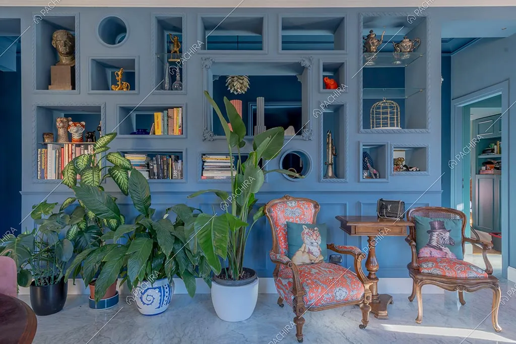 Zona living dell'appartamento Zambesi, location in stile eclettico a Roma