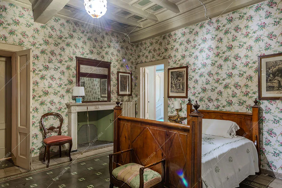 Camera da letto della dimora storica Ajoite, location in stile classico a Milano