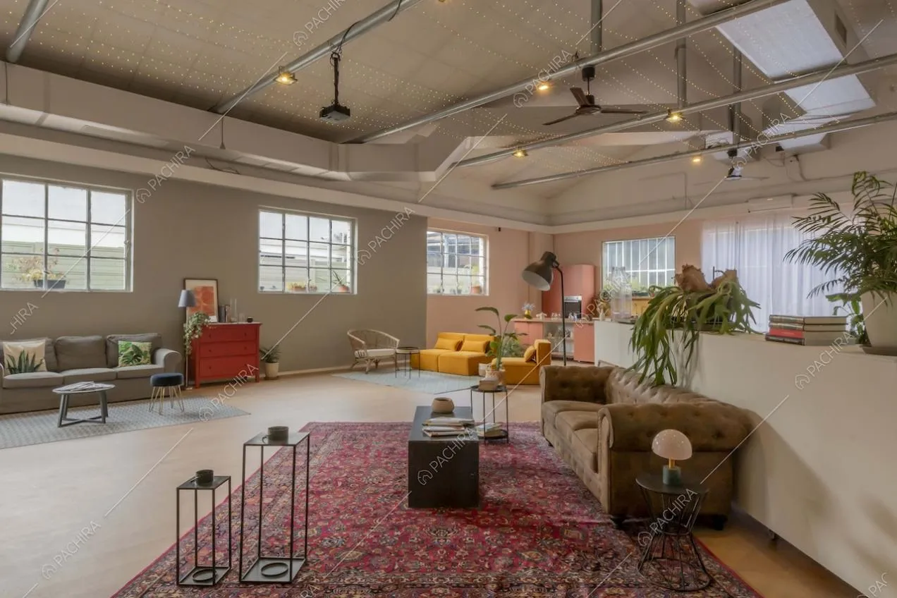 Zone living dello studio Eclipse, location in stile contemporaneo a Milano