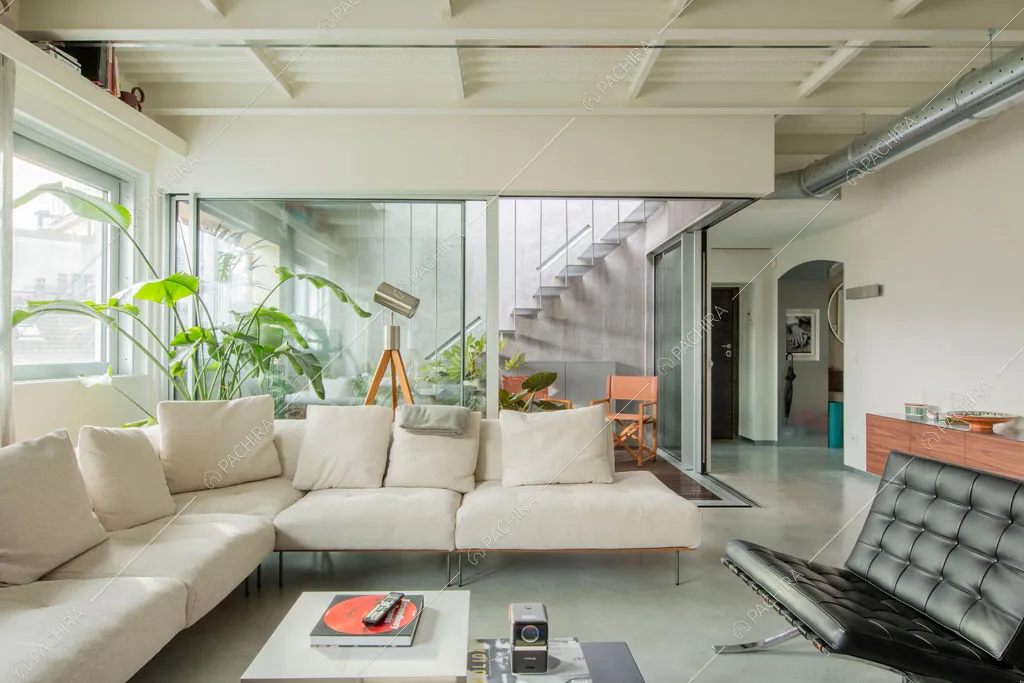 Salotto dell'appartamento Kamet, location in stile contemporaneo a Milano
