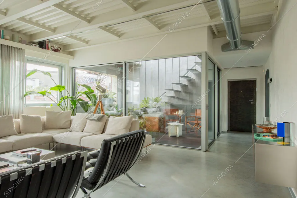 Zona living dell'appartamento Kamet, location in stile contemporaneo a Milano