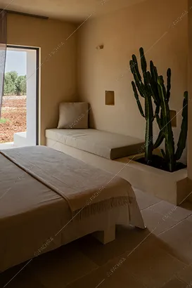 Camera da letto della masseria Kyanite, location in stile contemporaneo a Brindisi