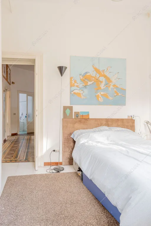 Camera da letto della villa Oglio, location in stile moderno a Milano