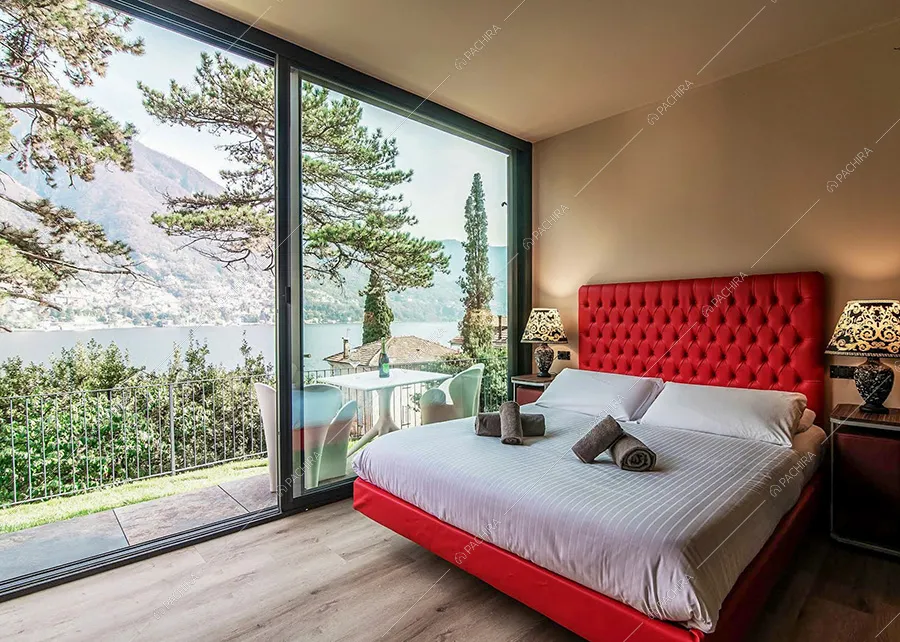 Camera da letto della villa Rangipo, location moderna per shooting a Como
