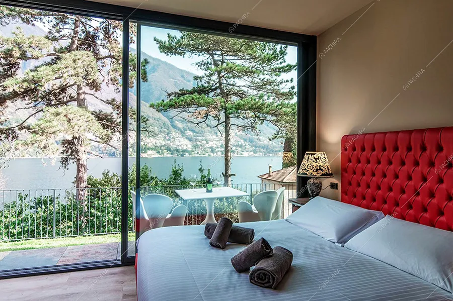 Camera da letto della villa Rangipo, location moderna per shooting a Como